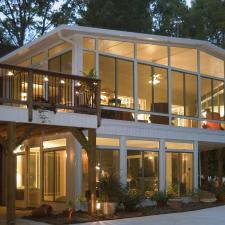 Modern Home Exterior with outdoor spot lighting lining pathway