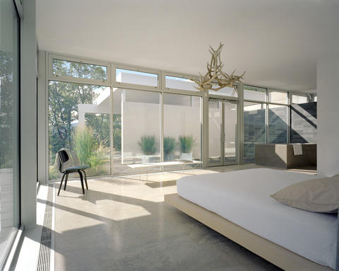 Contemporary Bedroom with ceiling to floor windows