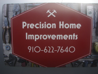 Precision Home Improvements LLC logo