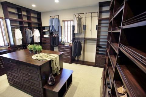 Traditional Closet with blind windows covering with wooden valance
