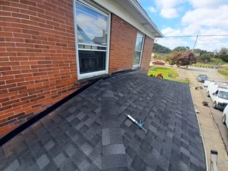 Penn West Roofing & Repair logo
