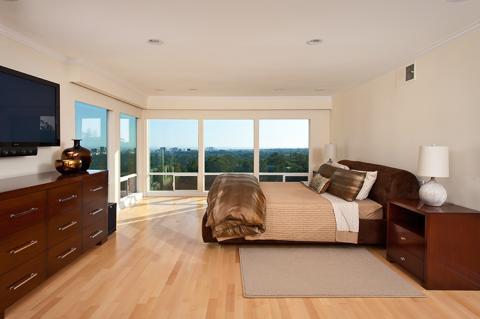 Contemporary Bedroom with windows floor to ceiling
