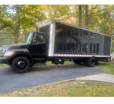 At Ease Moving Hauling & Delivery logo