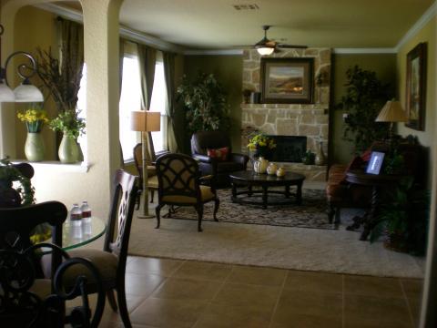 Traditional Family Room with wood and upholstery dining chairs