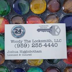 Woody the Locksmith LLC logo