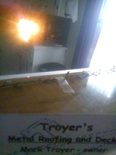 Troyer's Metal Roofing logo