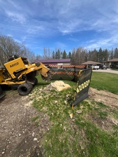 Logo for Carlson Stump Removal