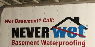 Never Wet Basement Waterproofing logo