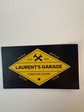 Laurent's garage logo