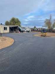 Rivas Earthwork and Paving logo