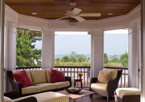 Contemporary Sunroom with woven outdoor furniture