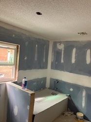 Rikko Drywall logo