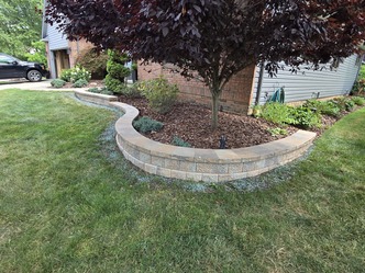 FLORES LANDSCAPING SOLUTIONS logo