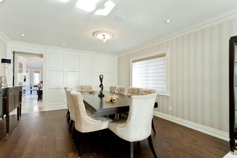 Transitional Dining Room with white velvet tufted dining chairs