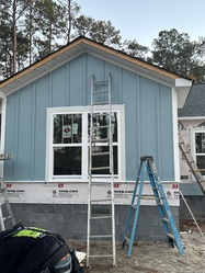 Ruiz Siding & Construction logo