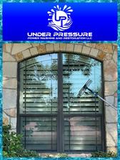 Logo for Under Pressure Power Washing and Restoration LLC