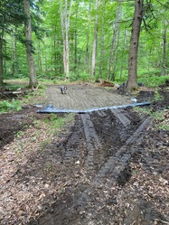 Muddy Trax Excavating logo