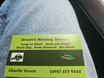 Green's Mowing Service logo
