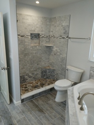Caitlin Elin bathroom Renovations llc logo