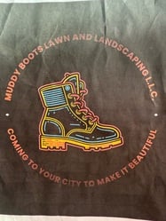 Muddy Boots Lawn and Landscaping LLC logo