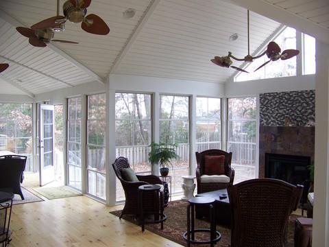 Eclectic Family Room with tongue and groove board ceiling