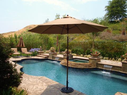 Southwestern Pool with stamped concrete pool surround