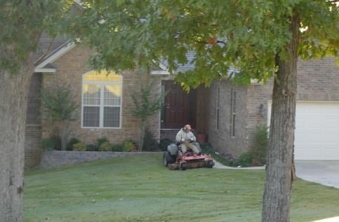 Logo for TOSH LAWN CARE