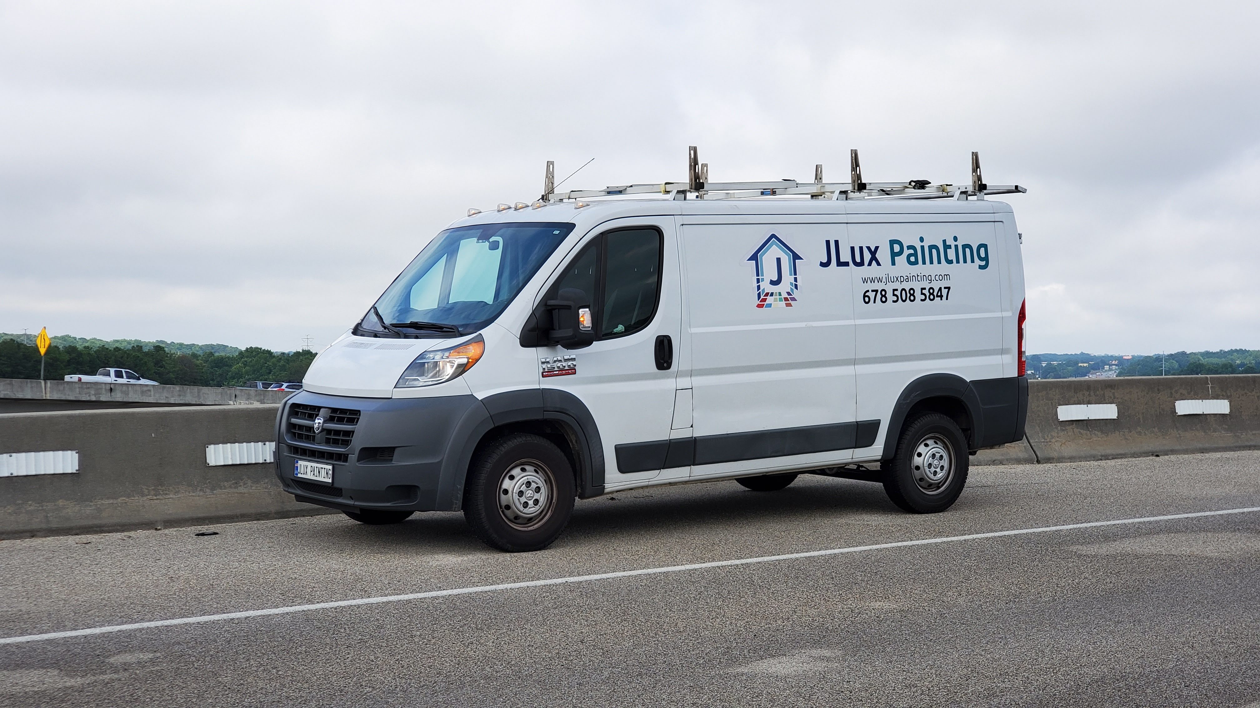 Logo for J Lux Painting