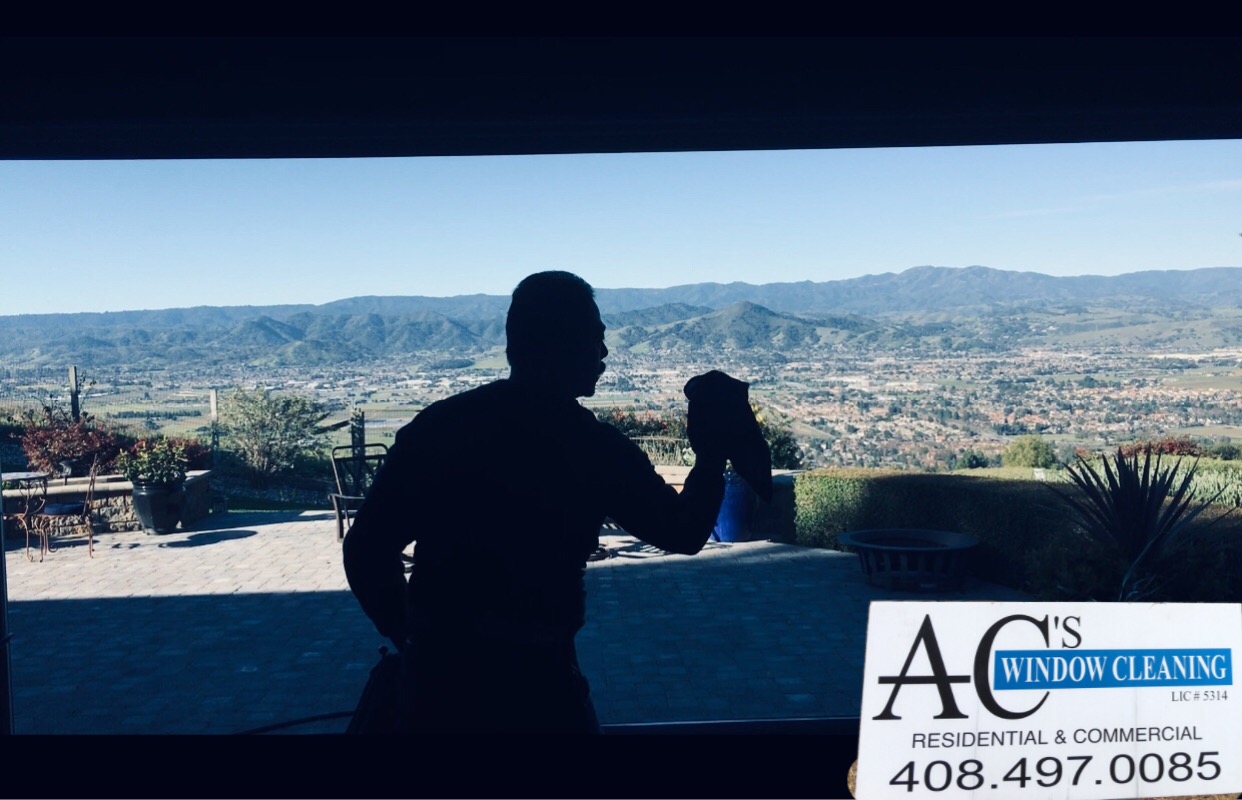 Logo for AC'S WINDOW CLEANING