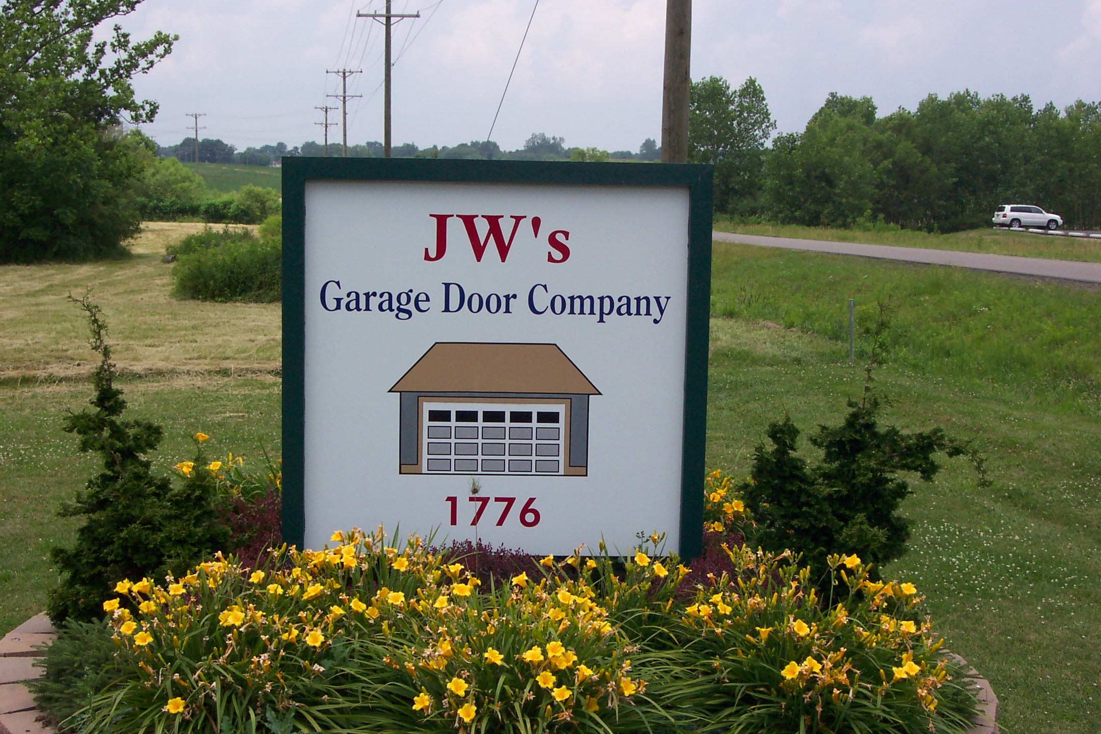 Logo for JW'S Garage Door Co LLC