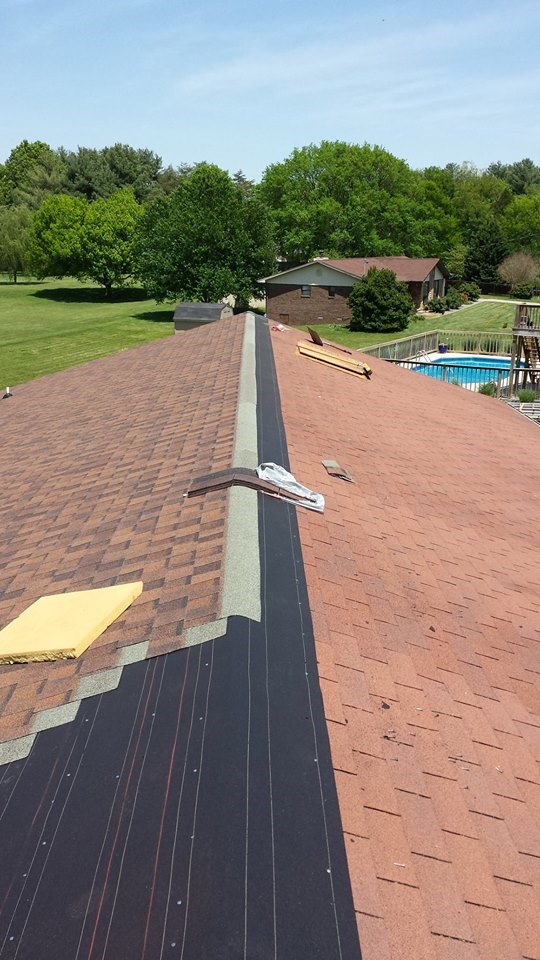 Logo for Peace Roofing