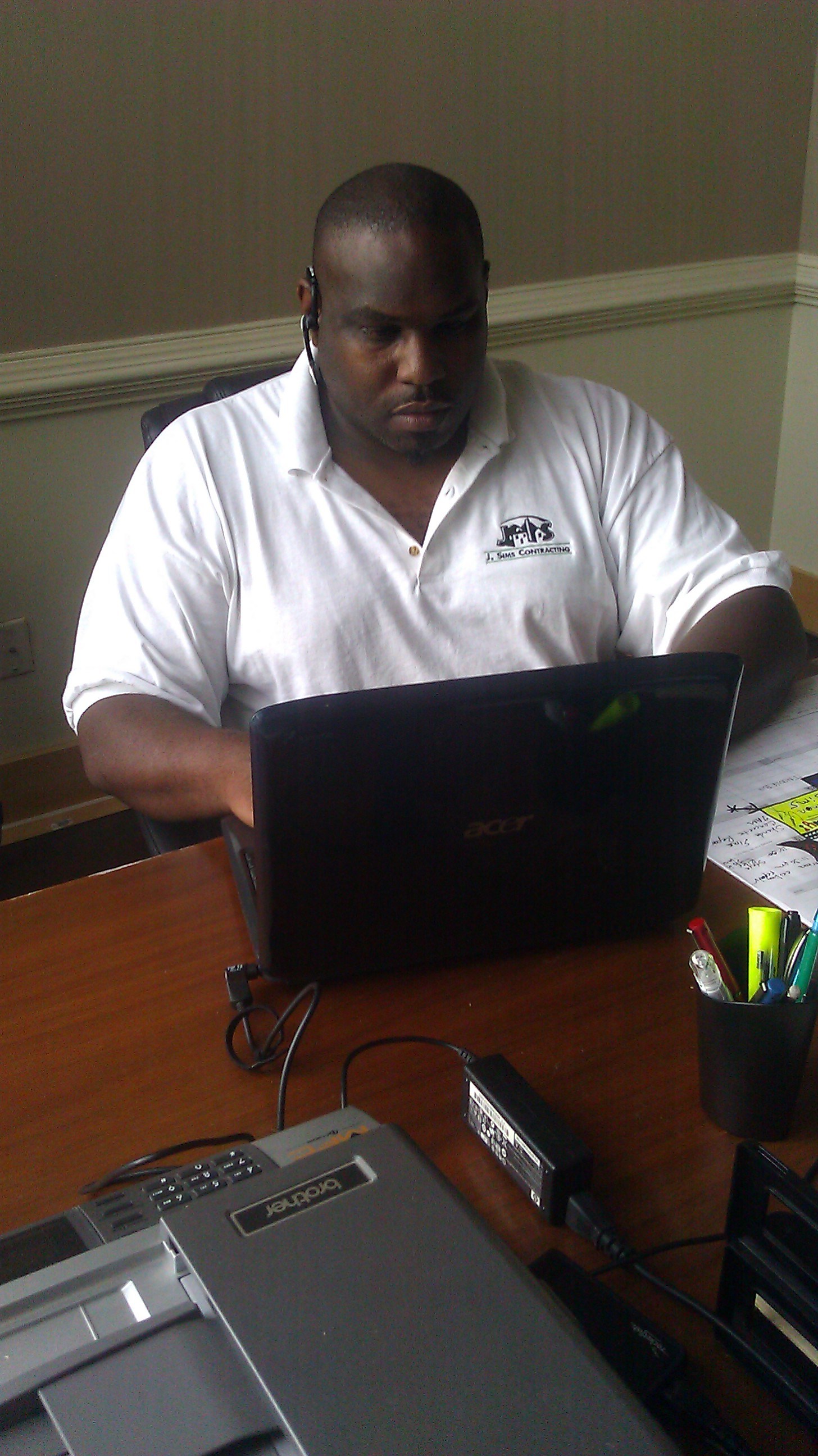 Logo for J. SIMS CONTRACTING
