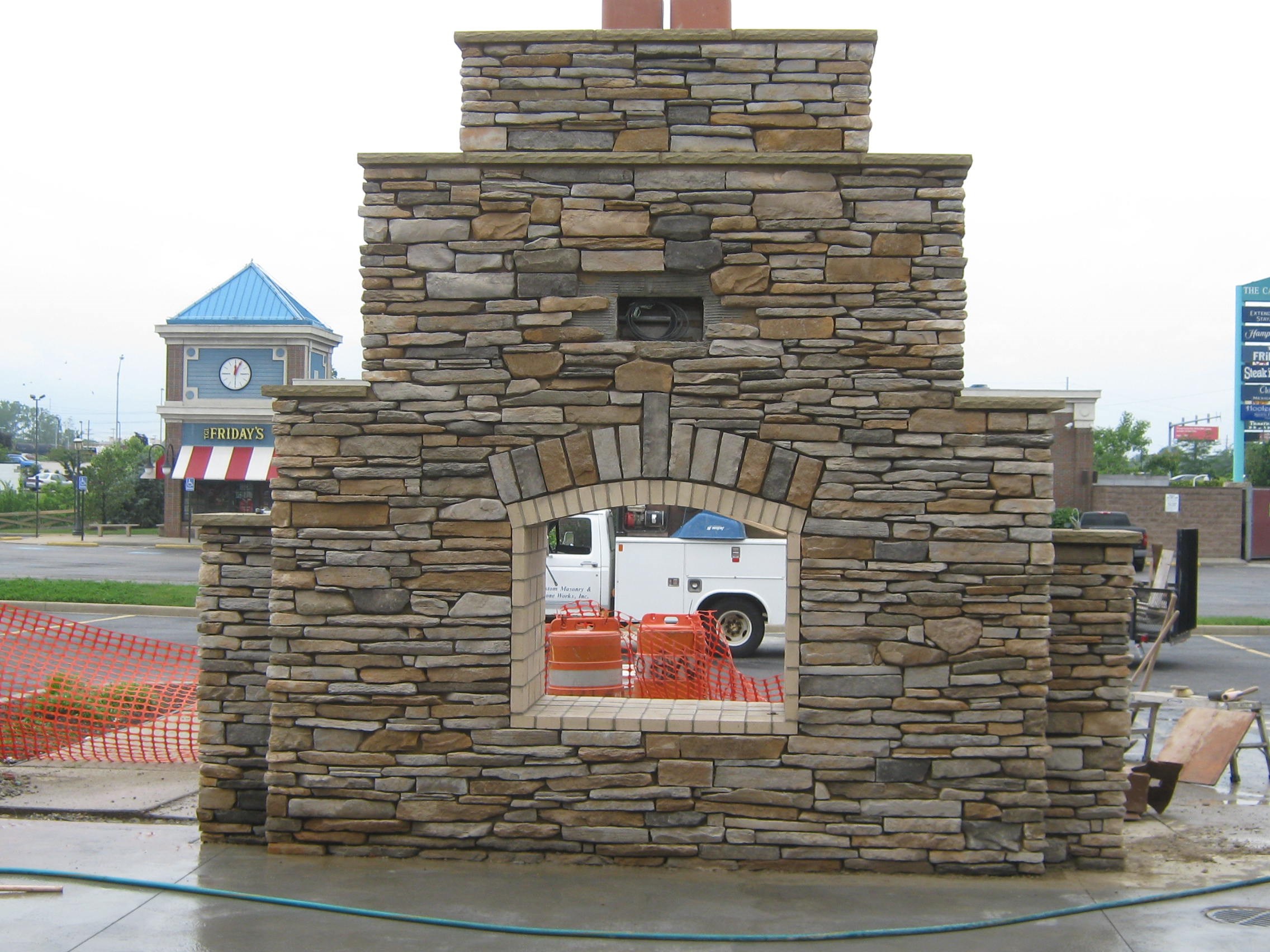 CUSTOM MASONRY & STONE WORKS INC logo