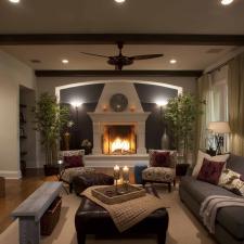 Transitional Family Room with wrought iron fire place screen
