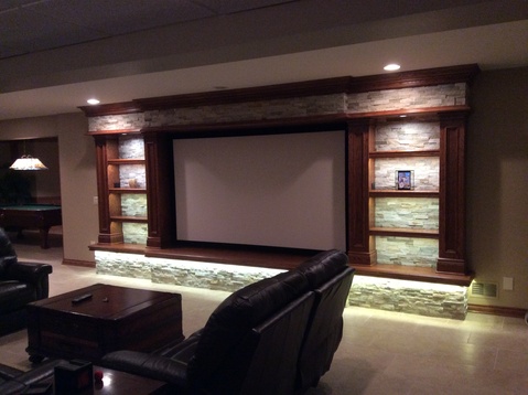Traditional Home Theater with ledger stone veneer