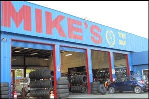 Logo for Mike's Tire Man
