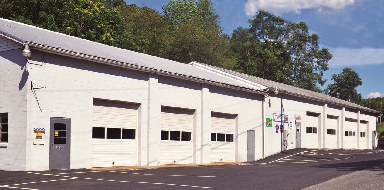 HERMANSADERS' GARAGE logo