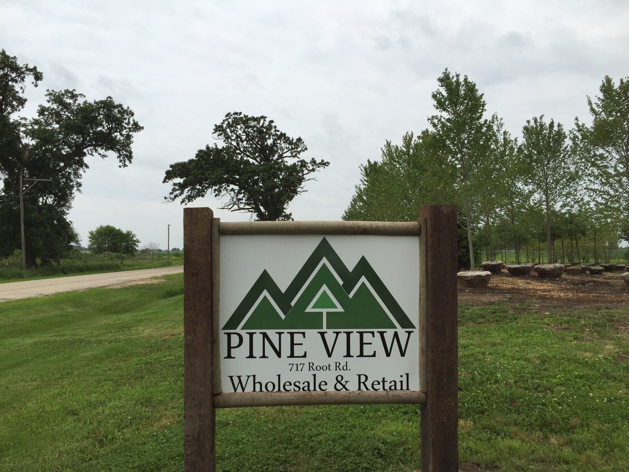 Pine view nursery and landscape logo