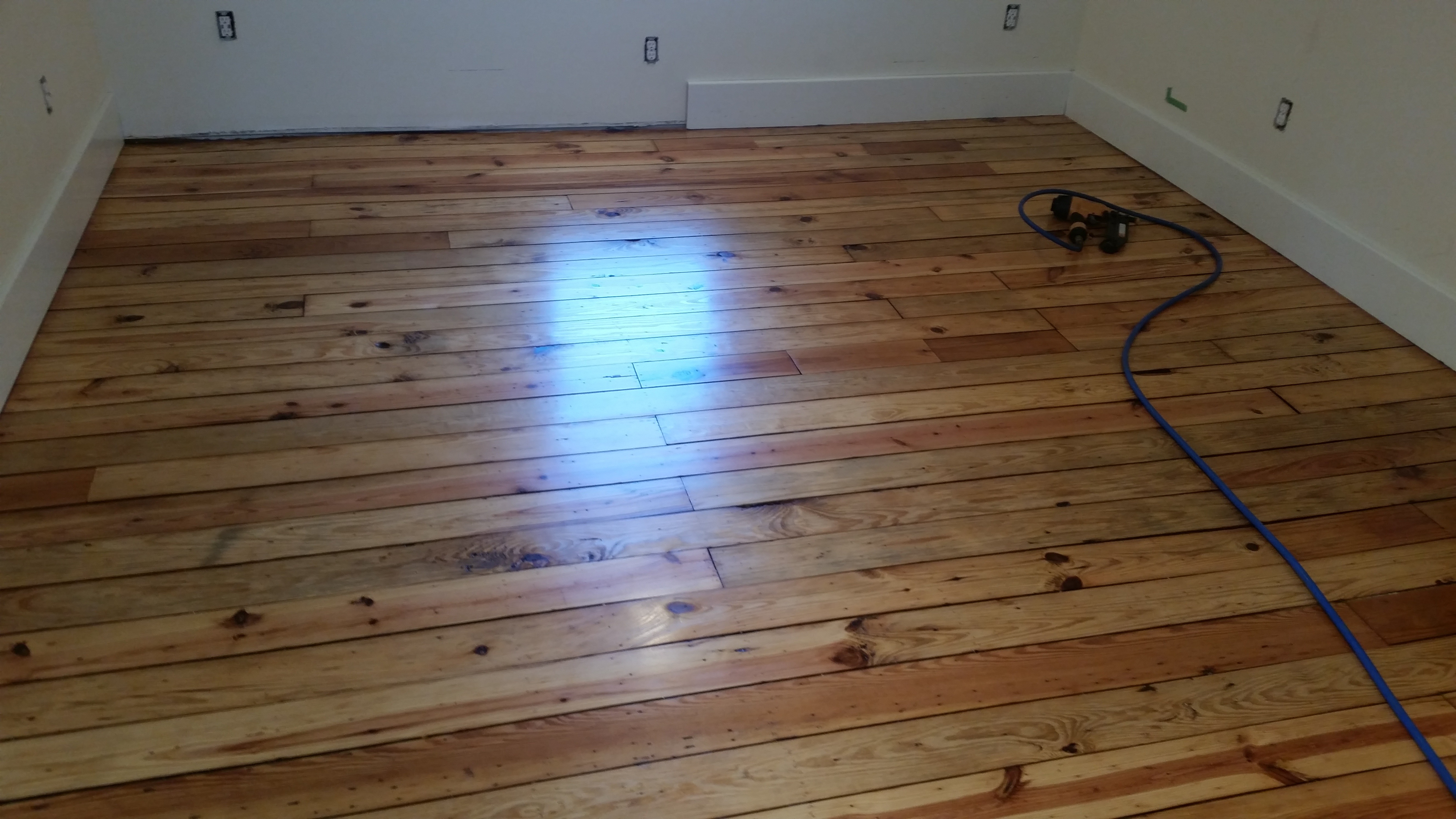 ALL American Hardwood and Tile Flooring logo