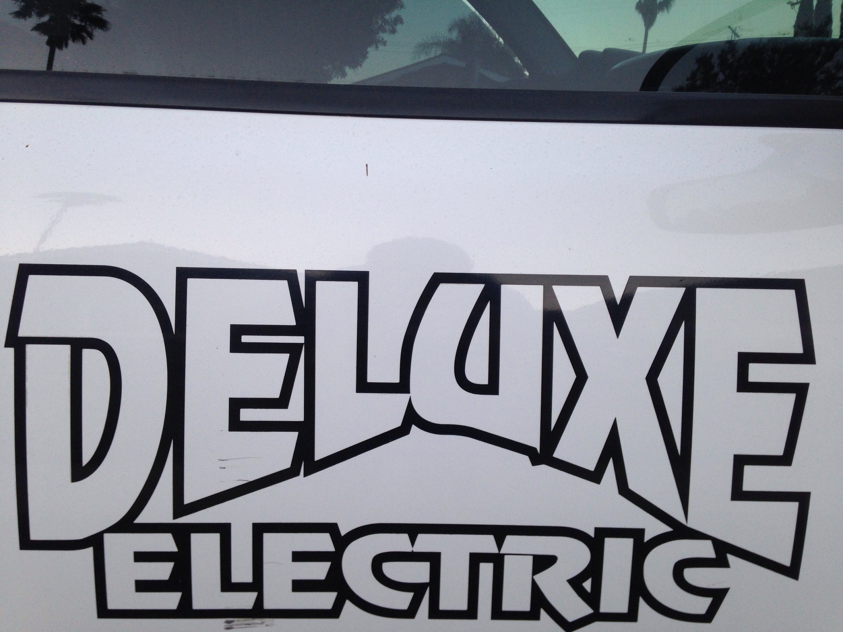 DELUXE ELECTRIC logo