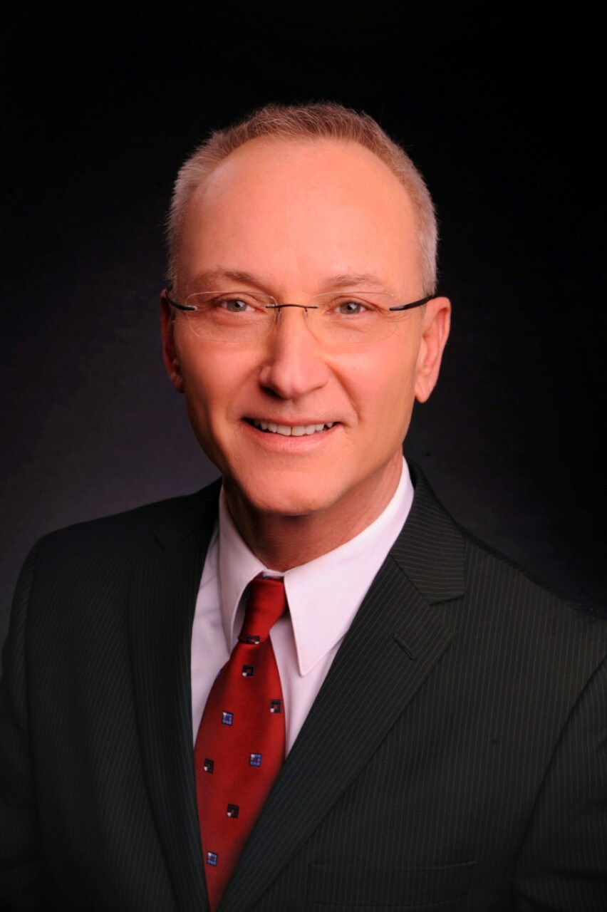 Keller Williams Realty, Tom Schoenbeck logo