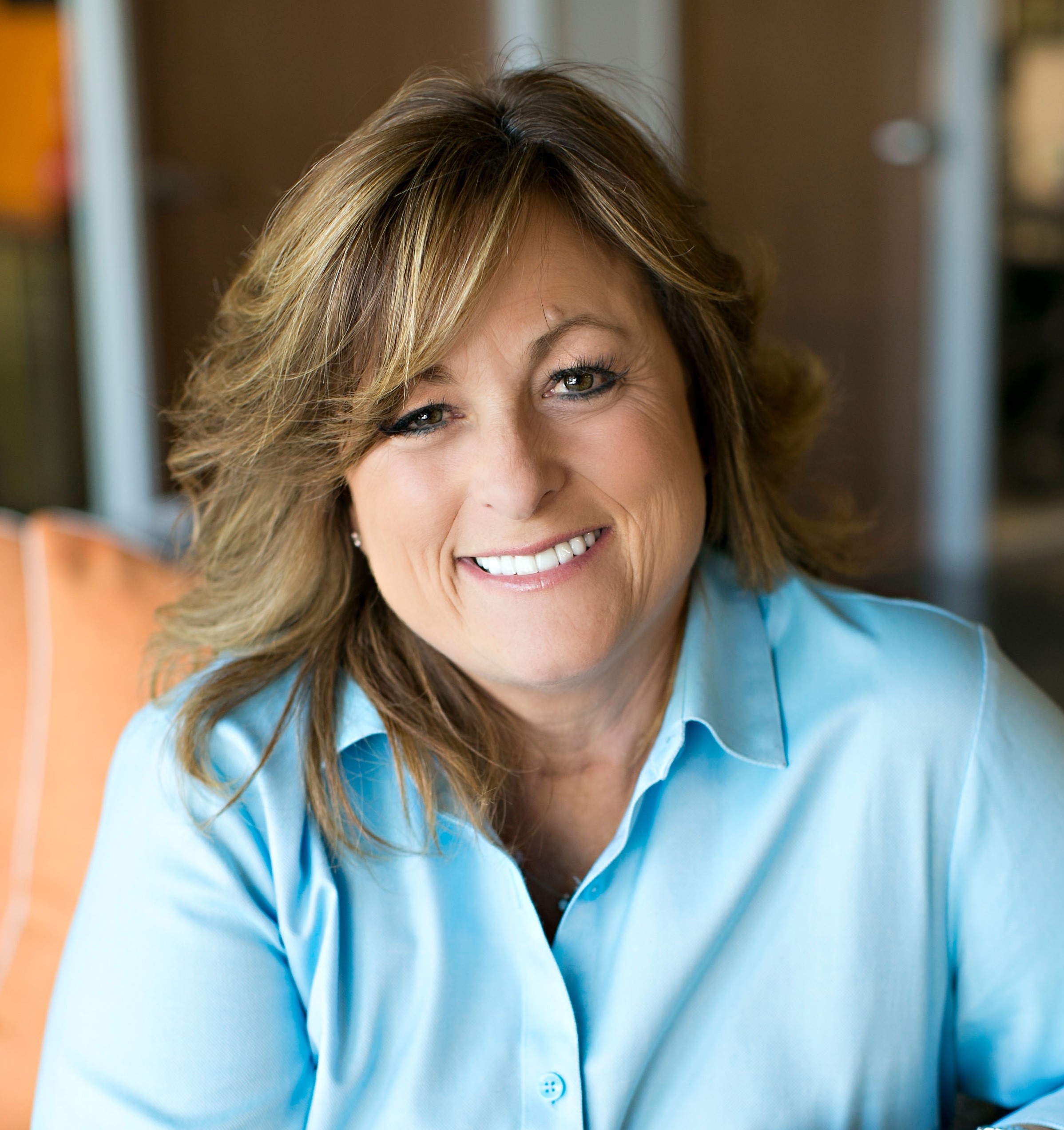 Dwell Realtors - Laura Bertolacci logo