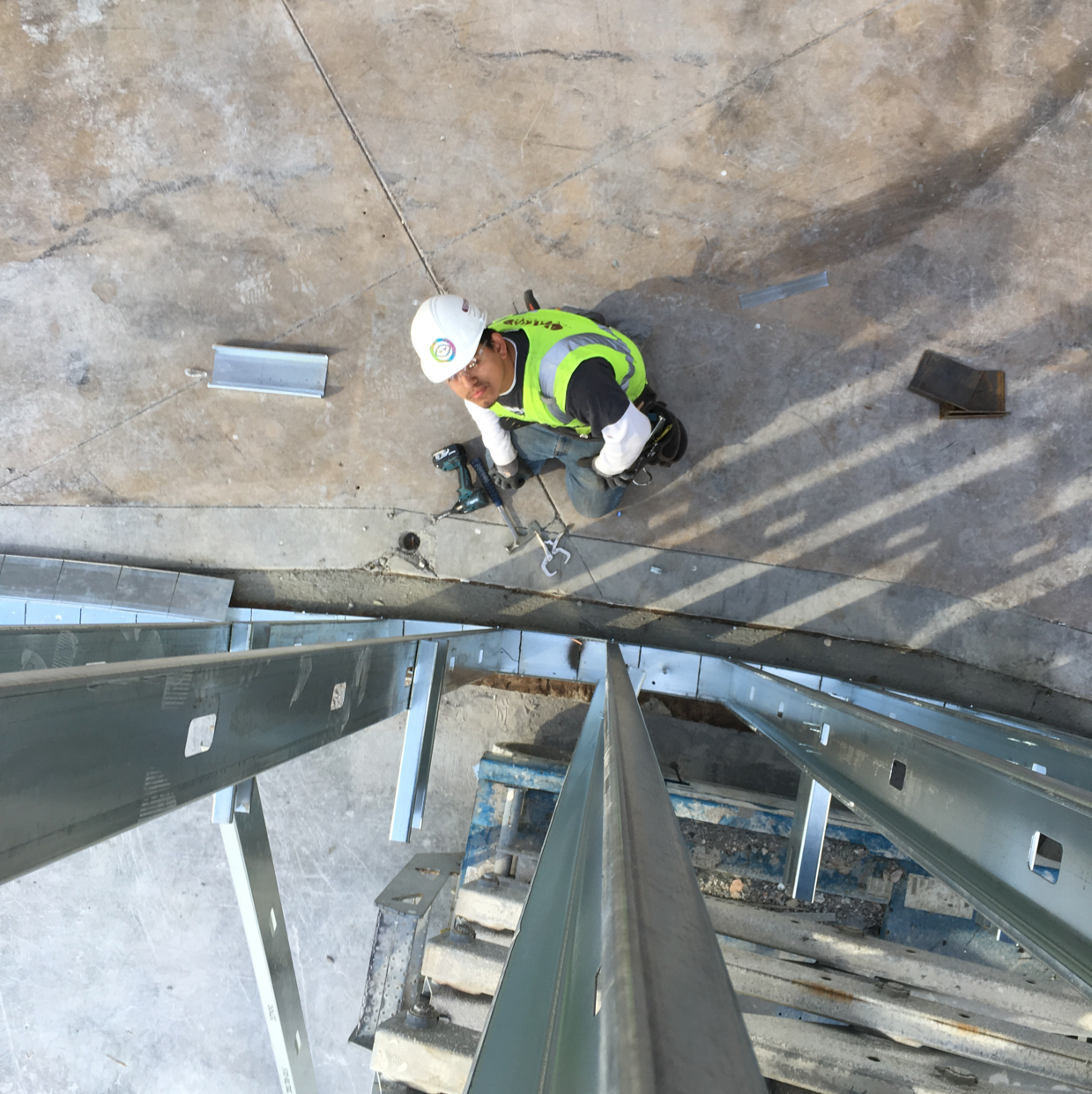 Top of The Line Construction logo