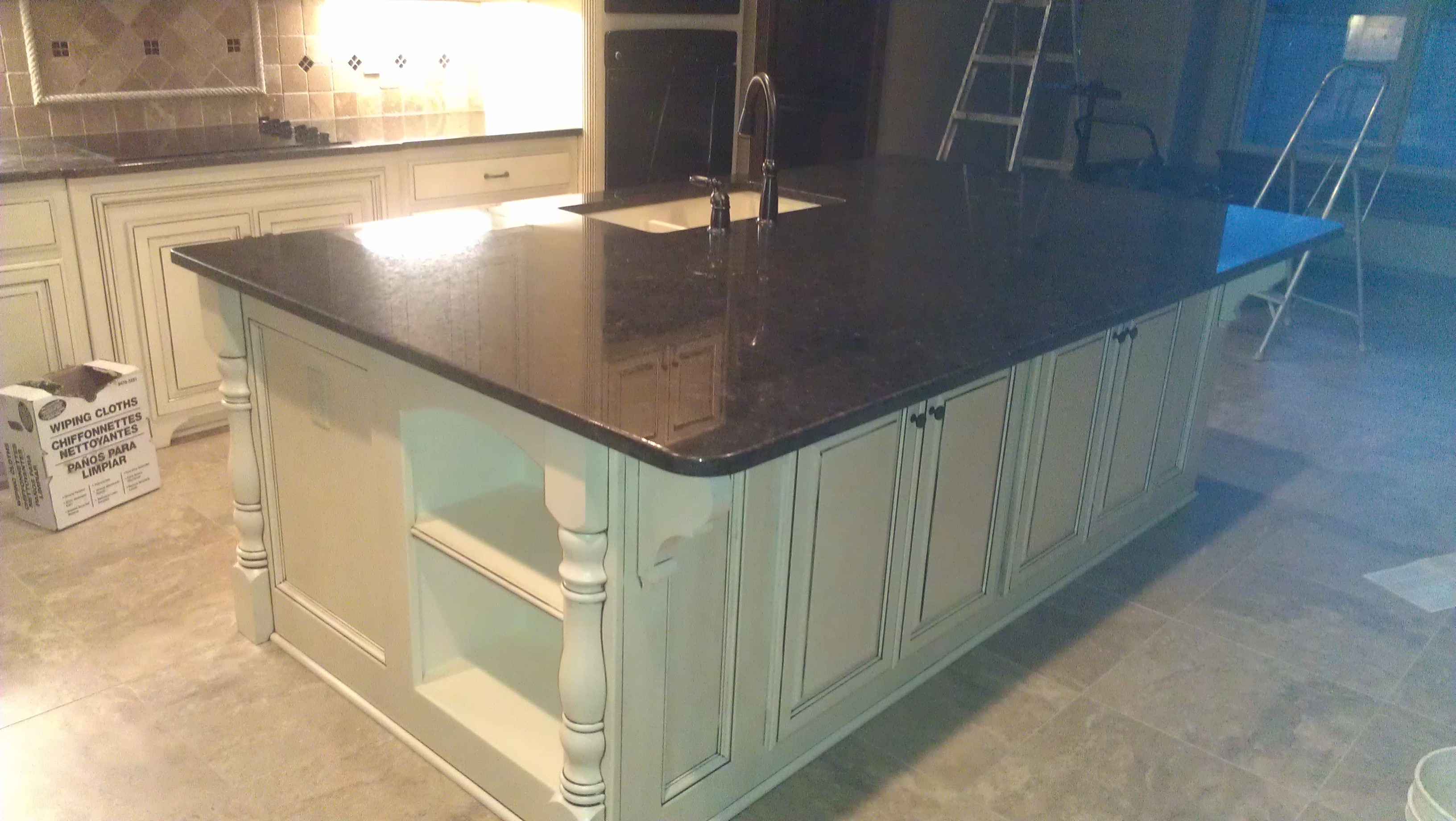EJ Tile and Granite logo