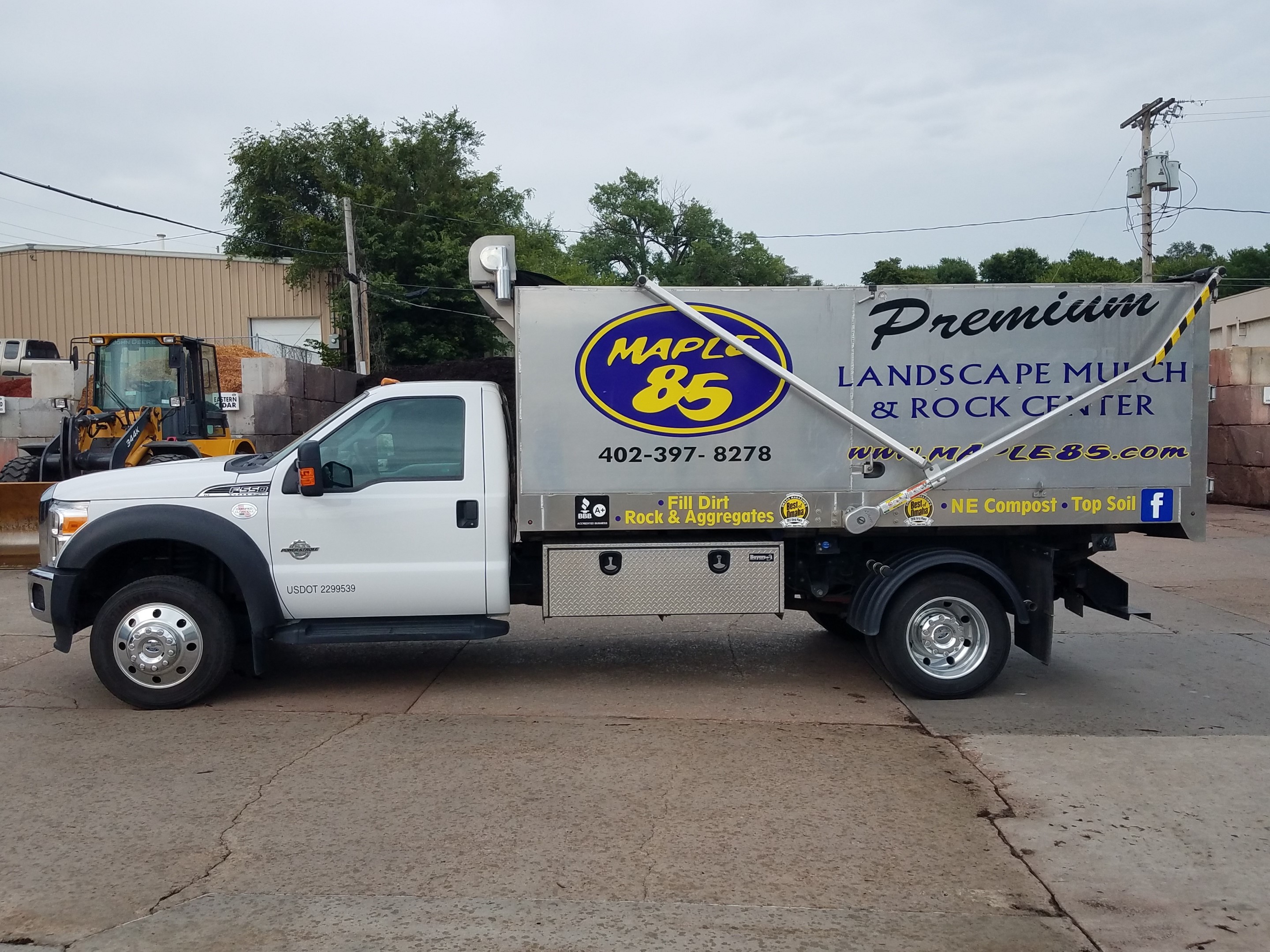 Maple 85 Premium Landscape Mulch & Rock Center logo