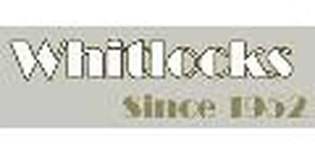 Whitlocks Vacuum and Sewing Center logo