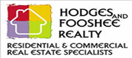 COLDWELL BANKER SNOW AND WALL logo