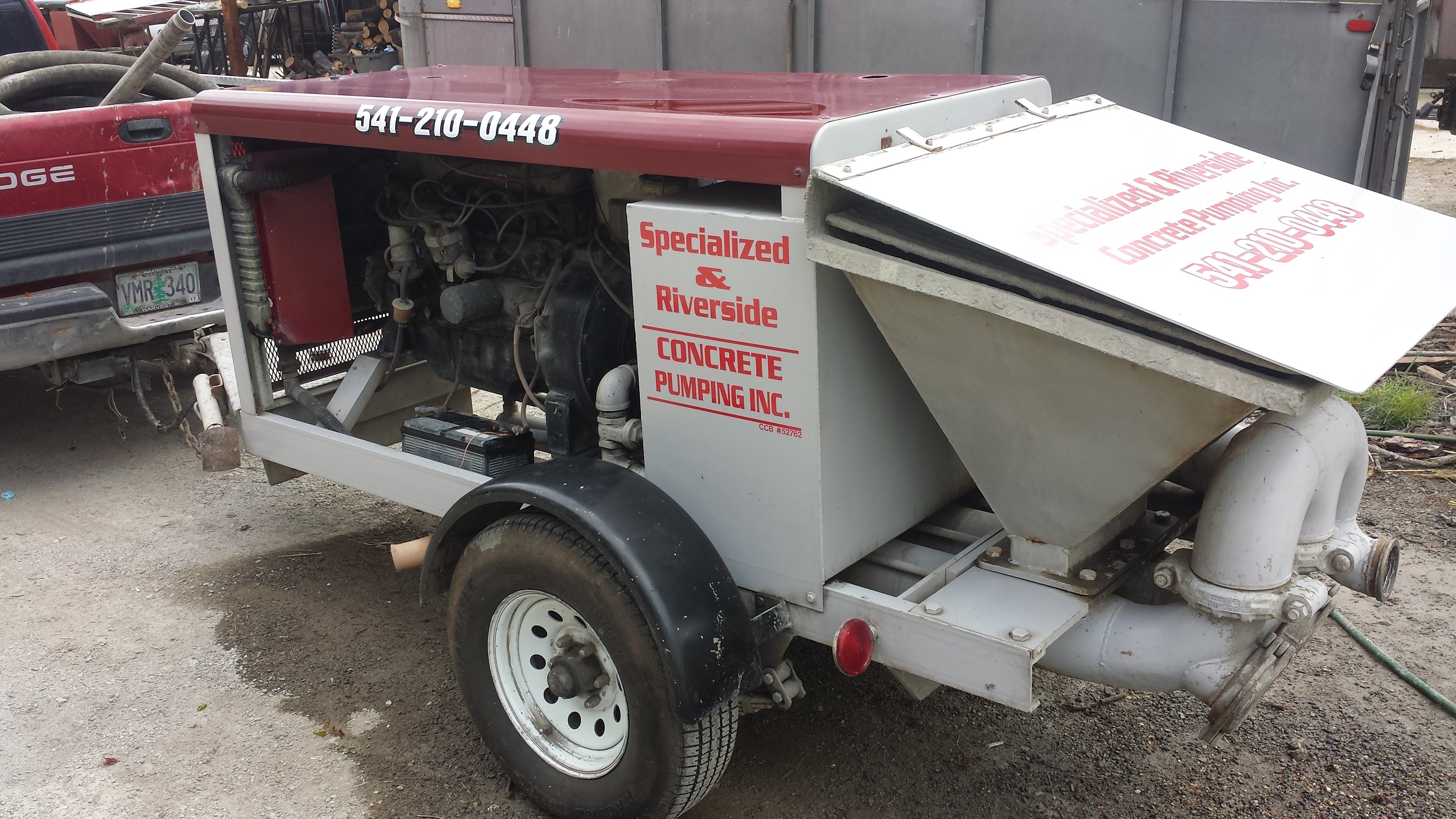 Specialized & Riverside Concrete Pumping logo