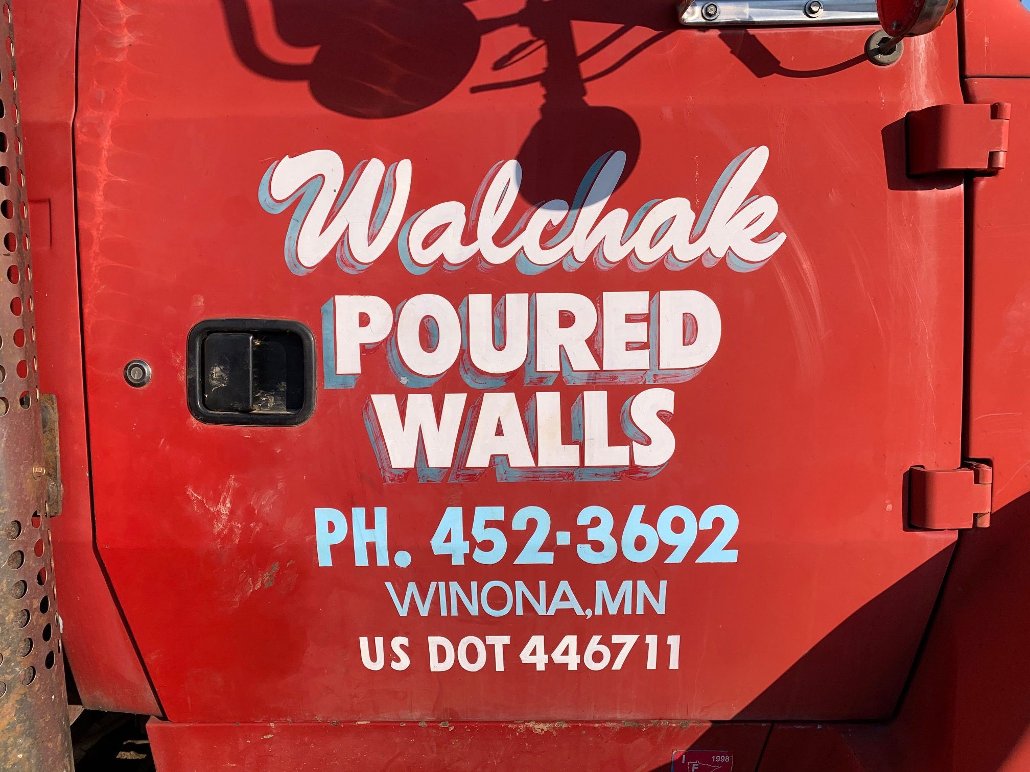 WALCHAK POURED FOUNDATIONS logo
