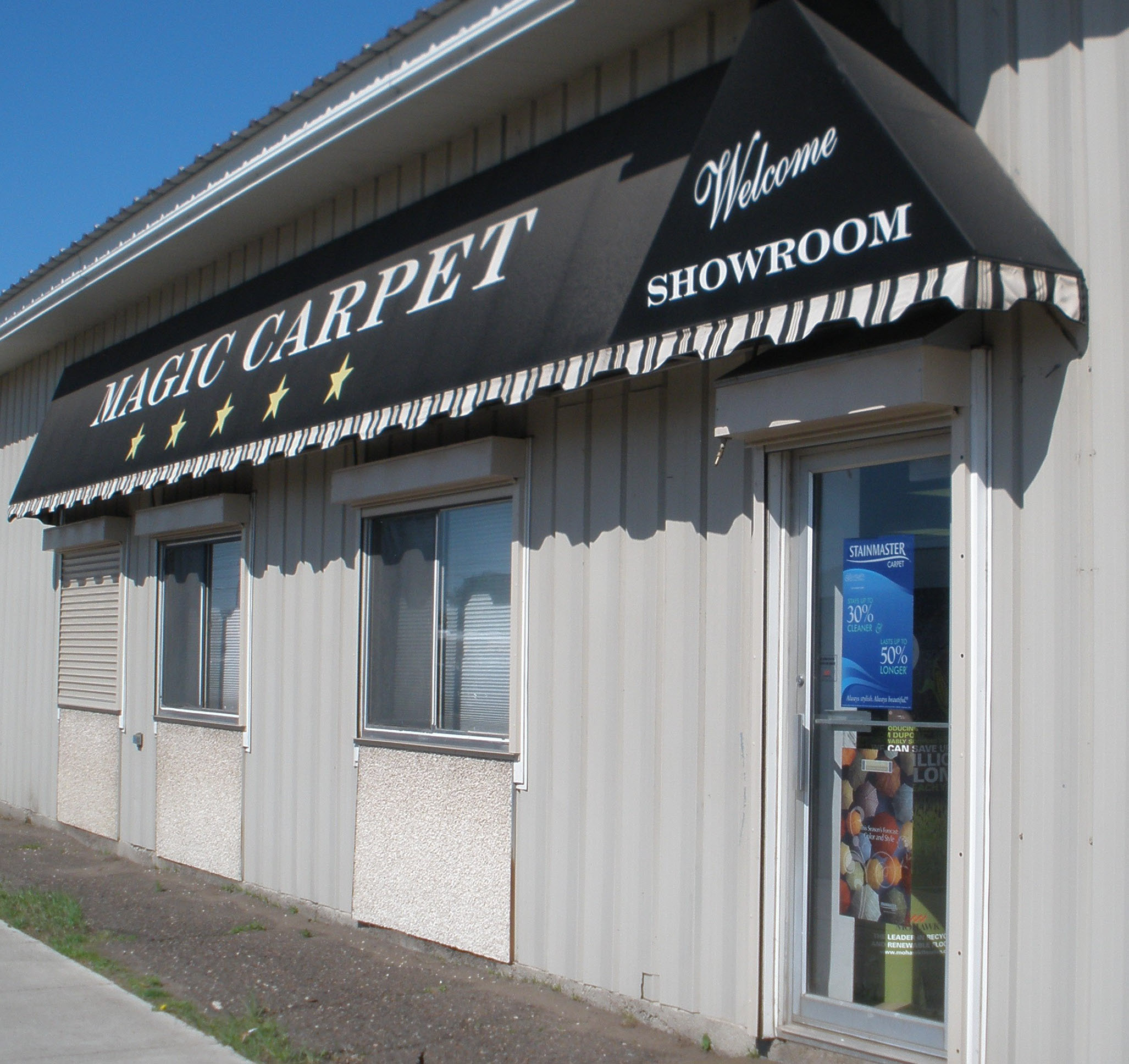Magic Carpet Mart logo